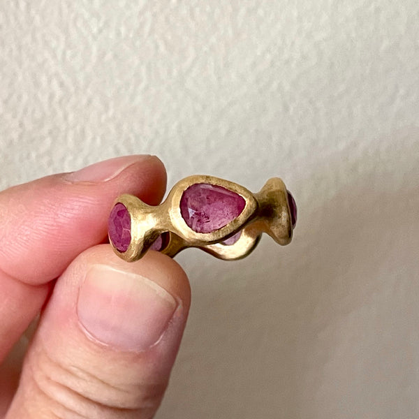 pink sapphire sculptural eternity band