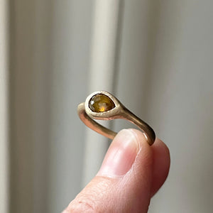 chartreuse-y cognac diamond ring