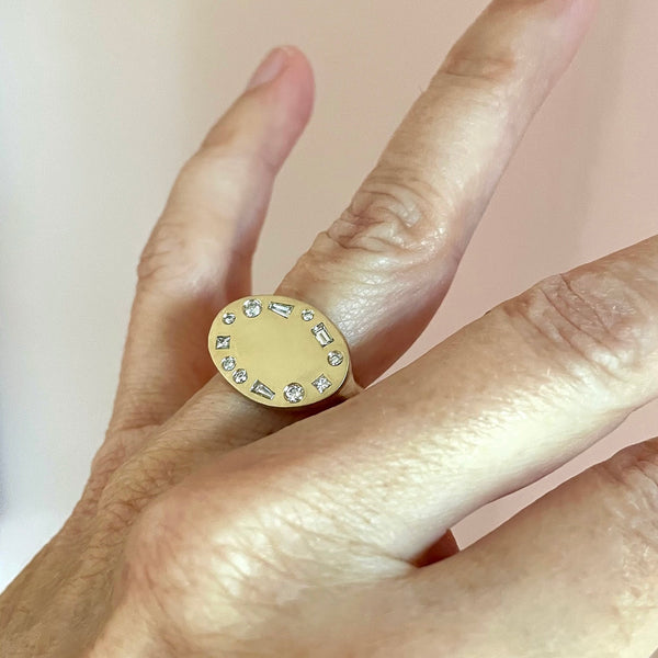 oval halo studded signet