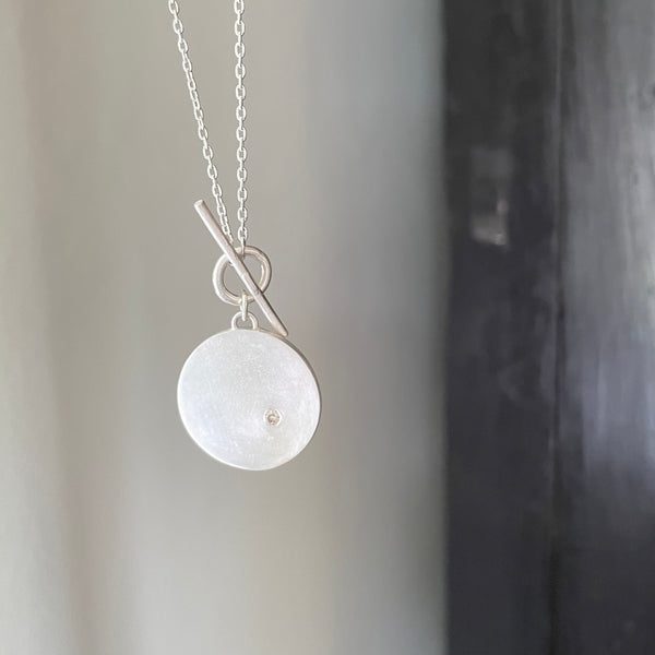 kinetic disc pendant
