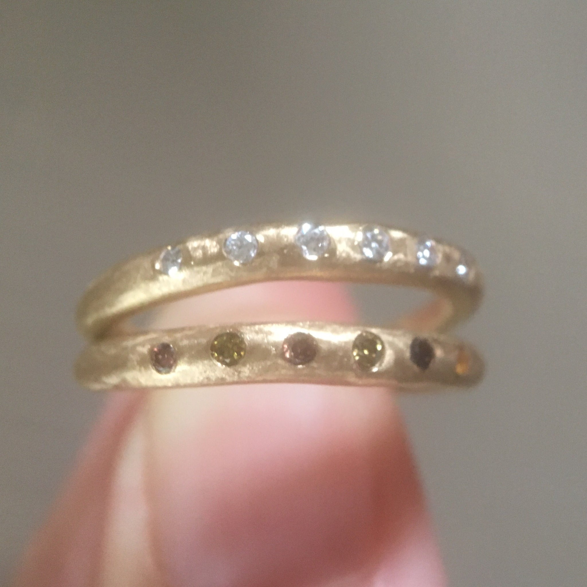 thin tapered band with six fine diamonds